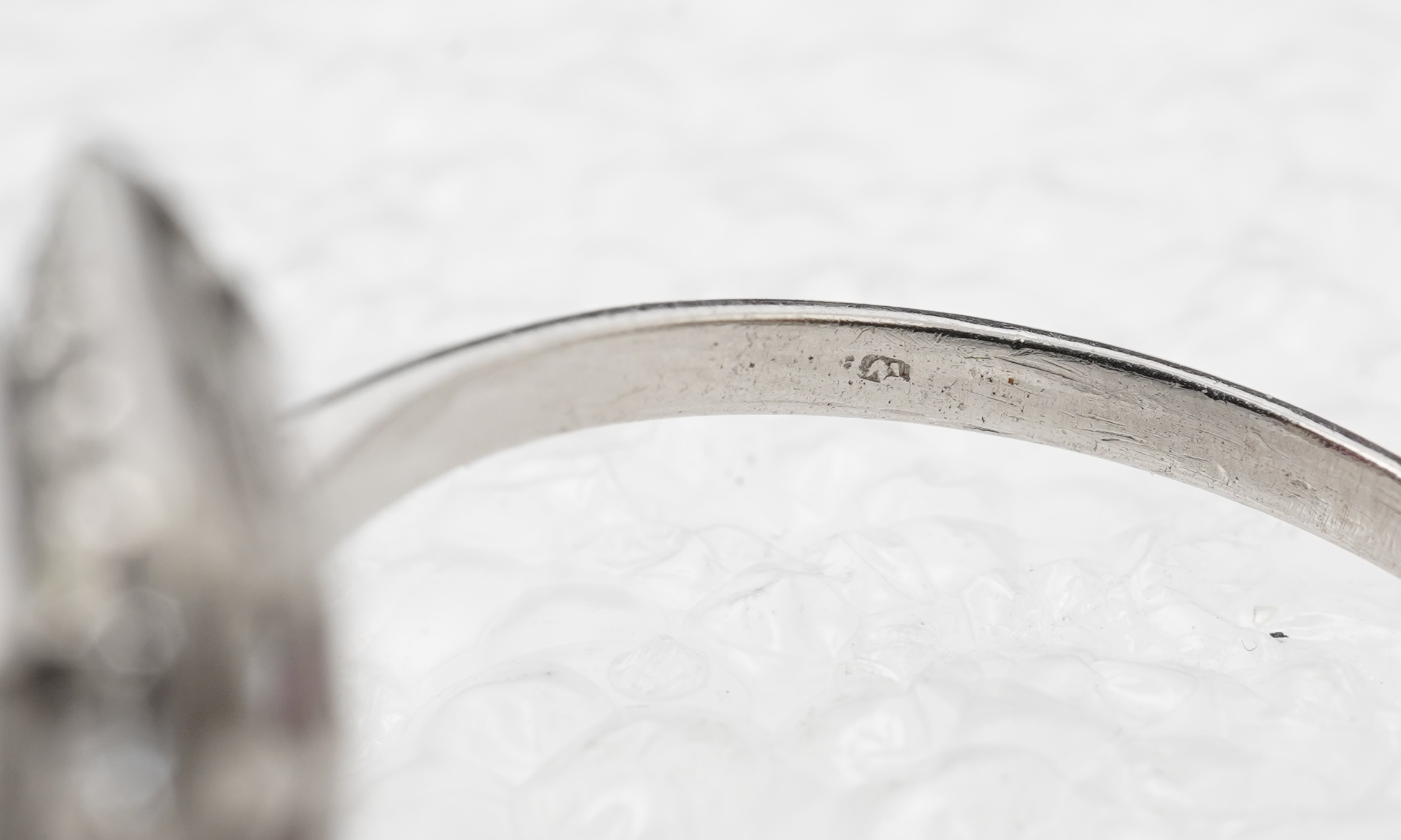 A synthetic ruby and diamond cluster ring, early 20th century